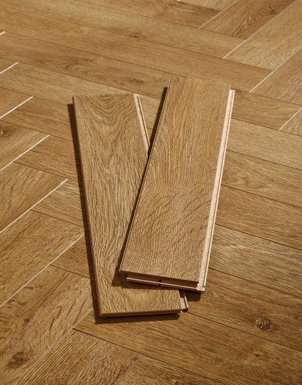 vintage chateau herringbone golden brown laminate flooring