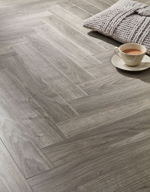 vintage chateau herringbone light grey laminate flooring