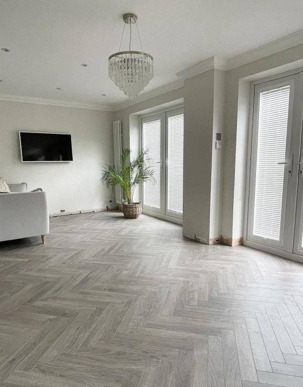 vintage chateau herringbone light grey laminate flooring