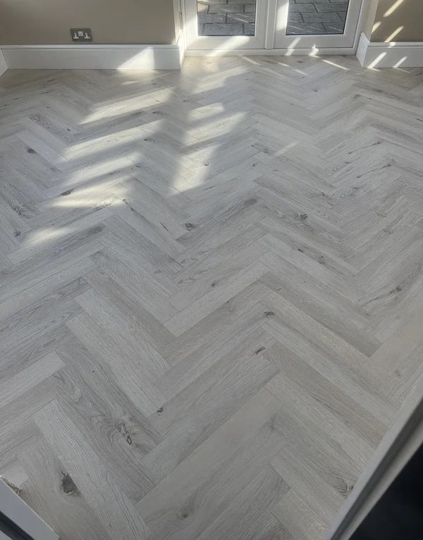 vintage chateau herringbone winter oak laminate flooring